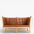 BM 1789 – Reupholstered Spoke back sofa in aniline leather (Cognac)