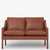 BM 2208 – Reupholstered 2-seater sofa in protected leather (Cognac)